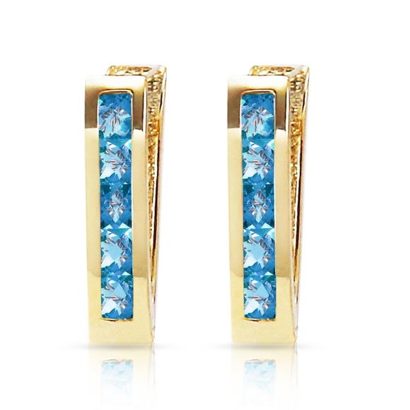 14K SOLID GOLD OVAL HUGGIE EARRING WITH BLUE TOPAZ - Picture 2 of 4